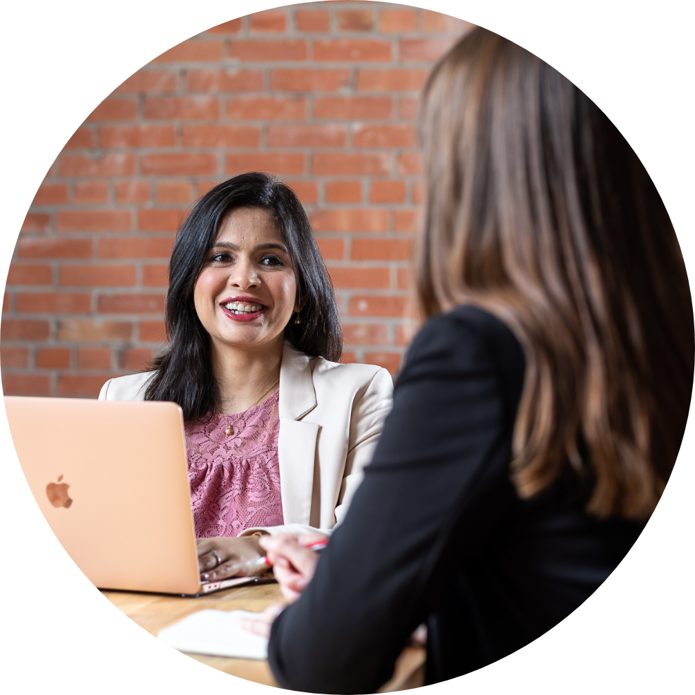 Smiling woman collaborating with team