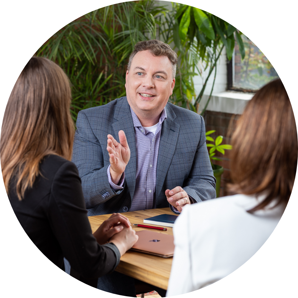 Man talking with colleagues